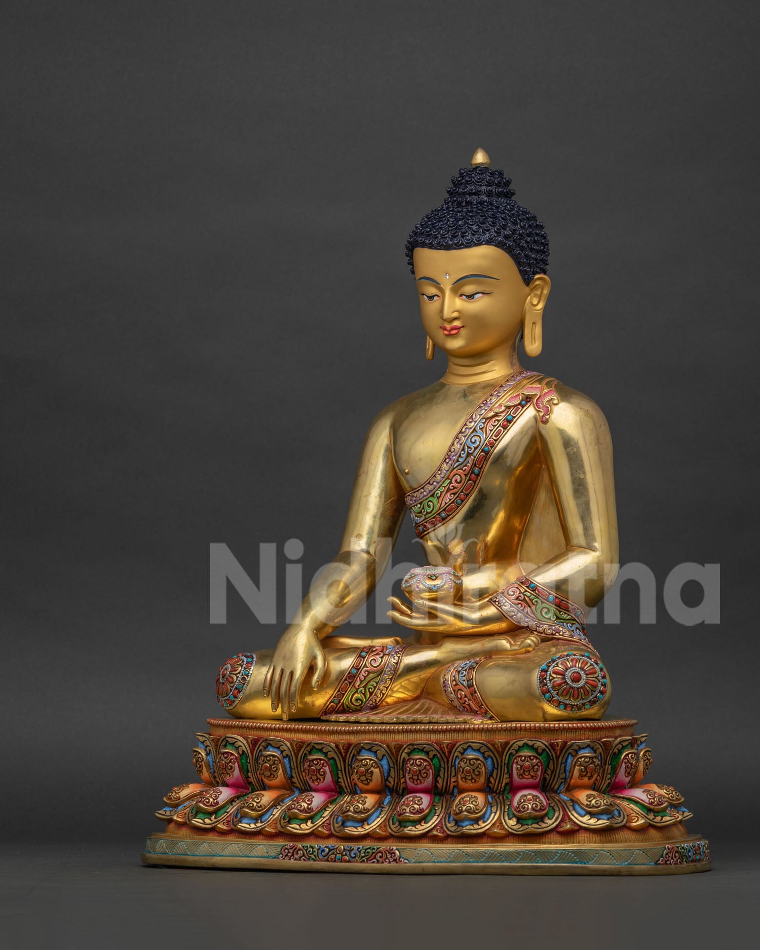 Left side view of handcrafted Buddha statue with hand-painted acrylic robe borders