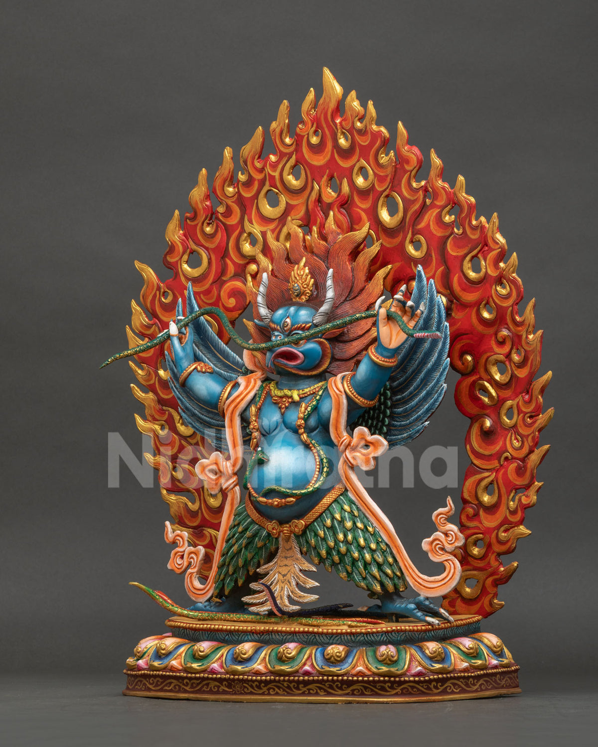 Left side view of handcrafted copper Garuda statue