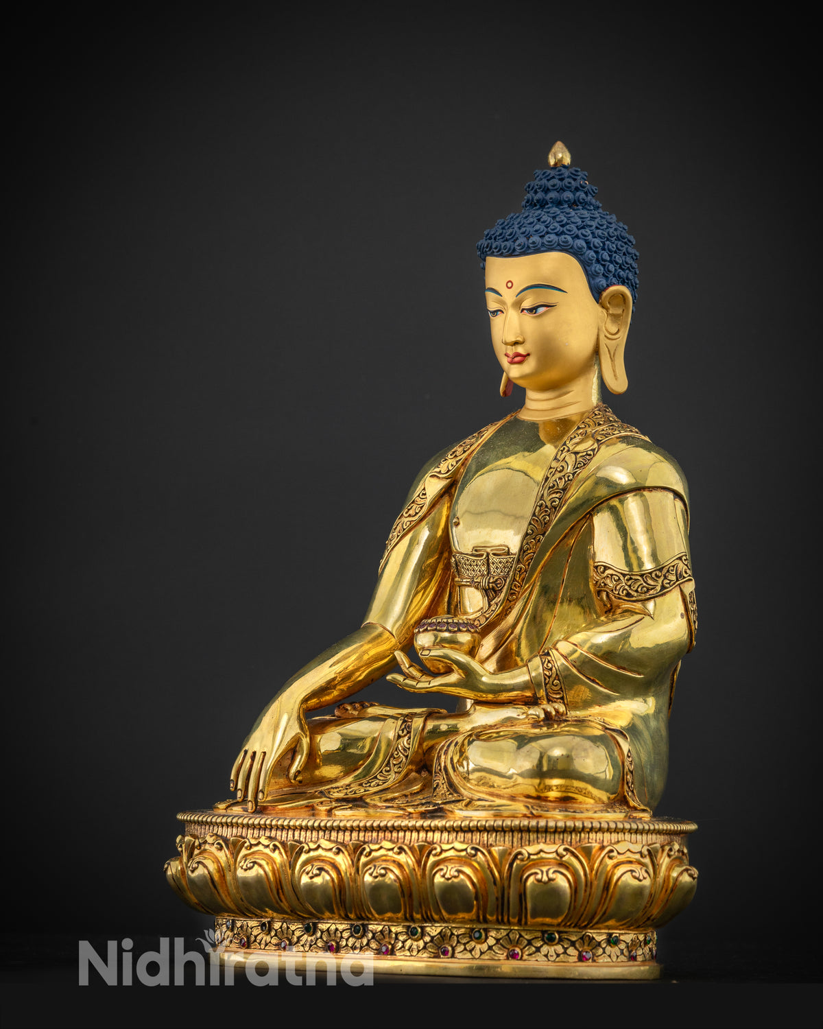 Left side view of handcrafted copper Shakyamuni Buddha statue