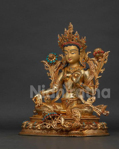 Left side view of handcrafted Green Tara statue, Nepalese temple art