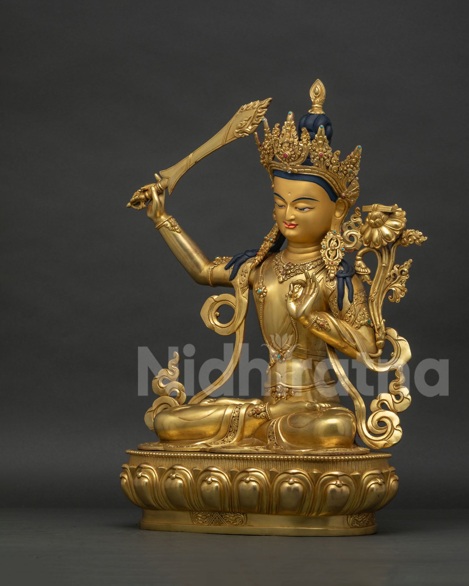 Left side view of handcrafted Manjushri Bodhisattva Statue from Nepal