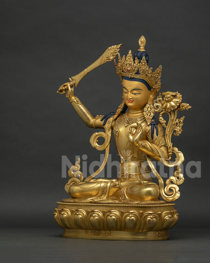 Left side view of handcrafted Manjushri Bodhisattva Statue from Nepal