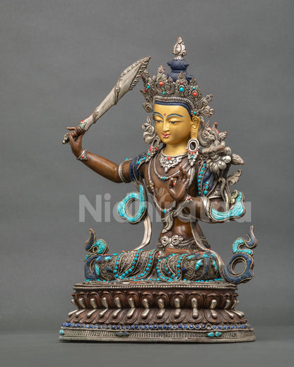 Left Side View of Handcrafted Nepalese Manjushri Statue Holding Wisdom Sword