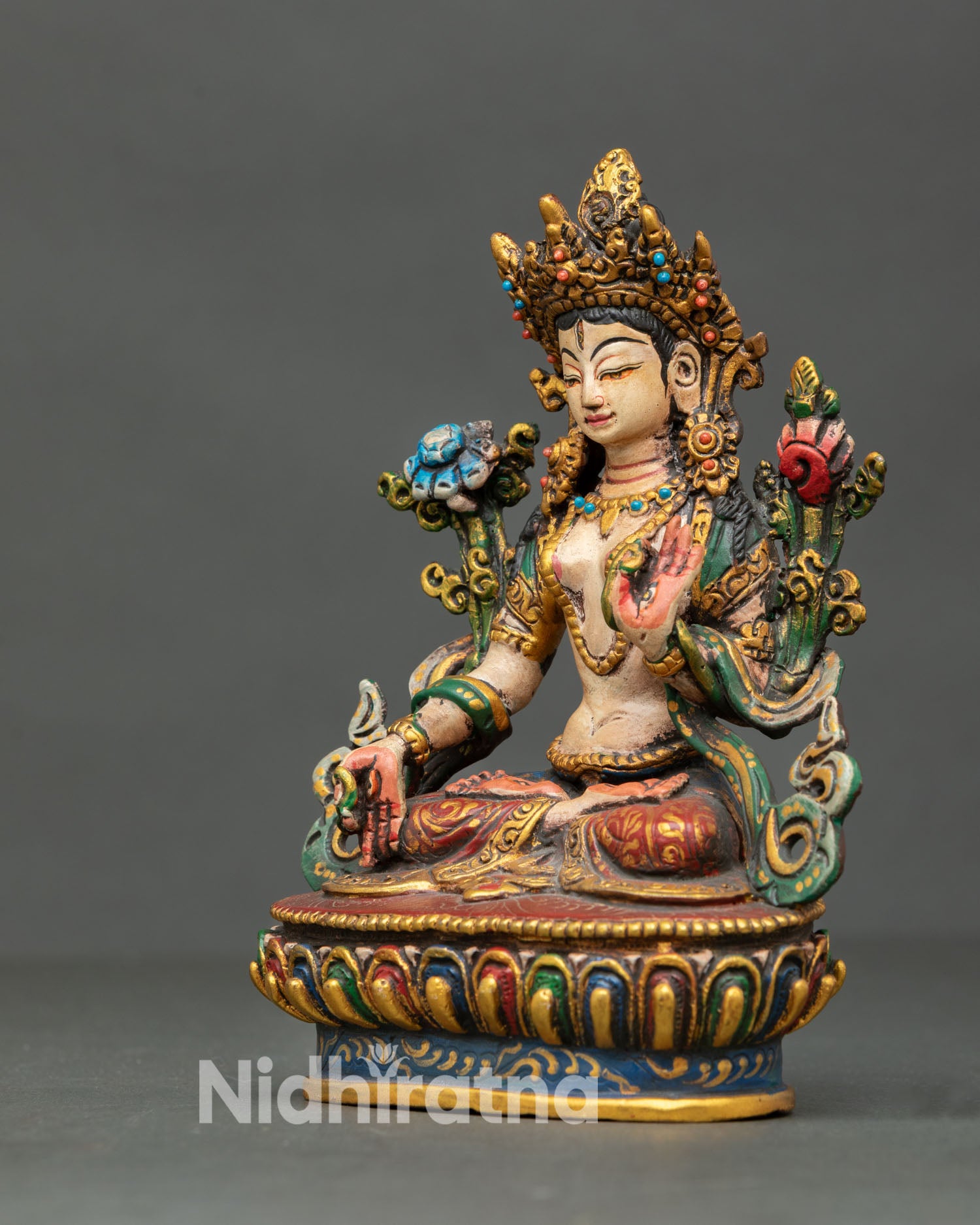 left side view of handcrafted white tara statue with acrylic color finish