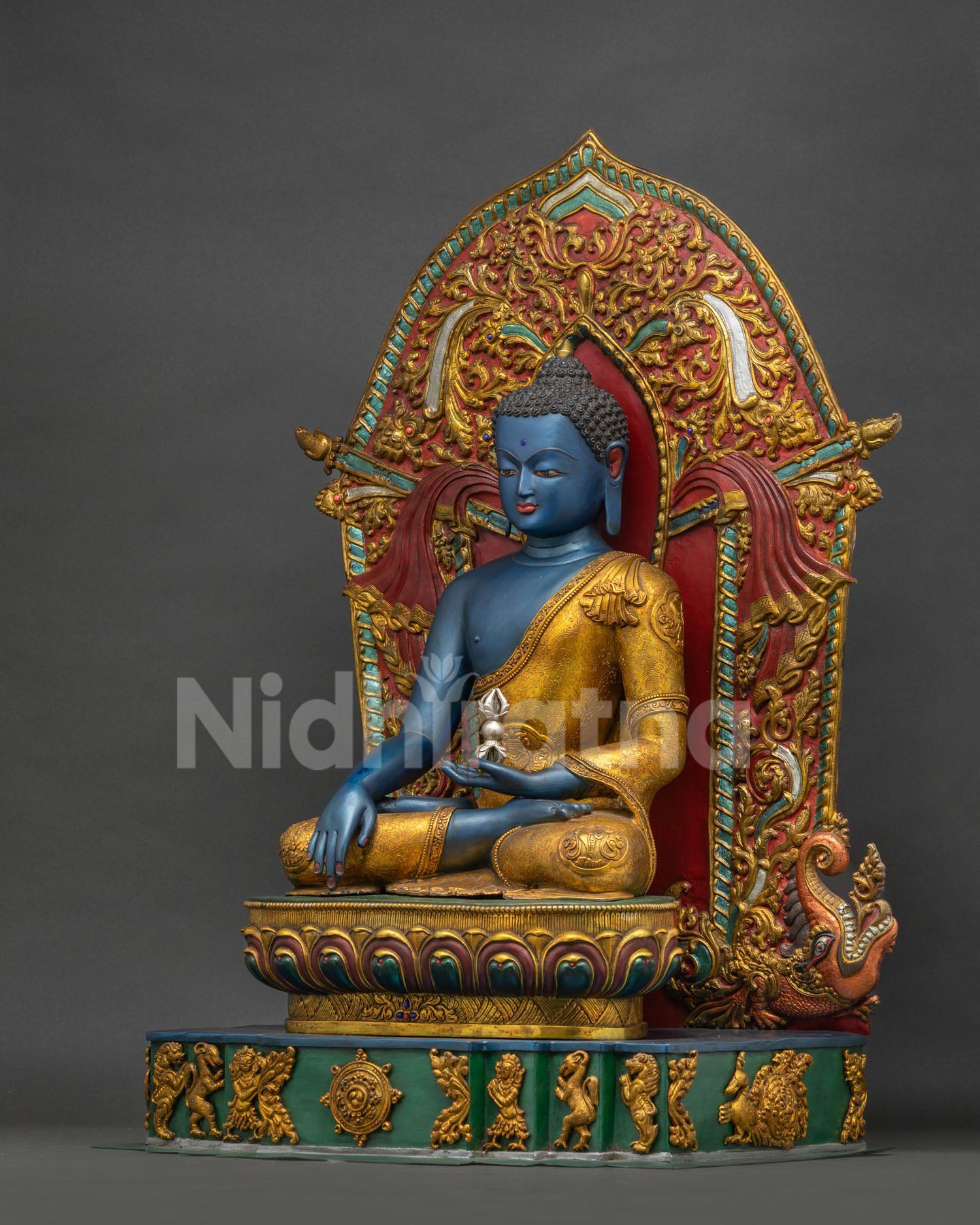 Left side view of handmade Akshobhya Buddha statue on lotus throne from Nepal