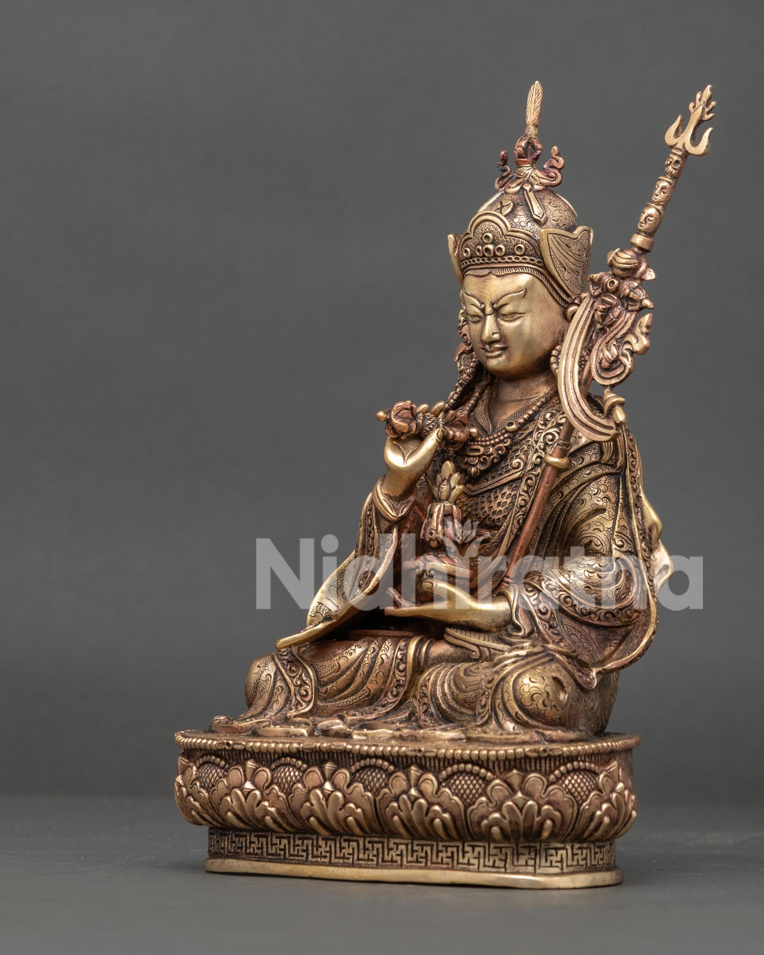 Left side view of handmade Padmasambhava Tsokye Dorje statue from Nepal