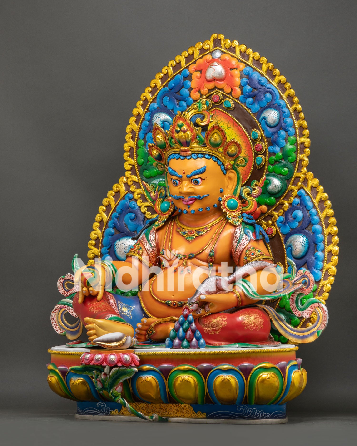 Left Side View of Handmade Yellow Dzambhala Statue Holding Jewel Spouting Mongoose