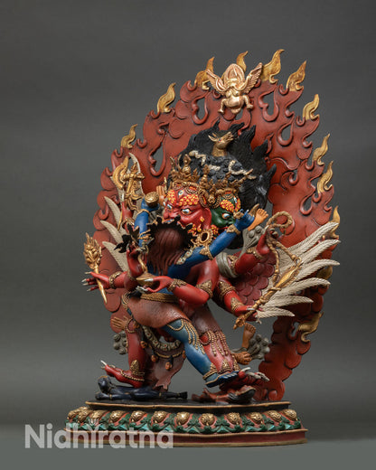 left side view of hayagriva sculpture with detailed wings, lotus seat and dynamic stance
