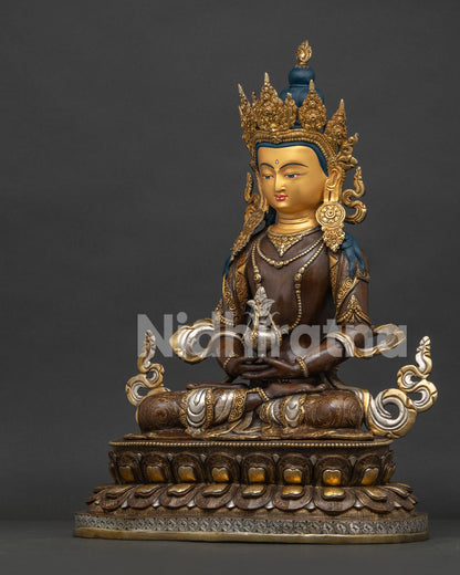 left side view of himalayan amitayus buddha statue with 24k gold gilded details