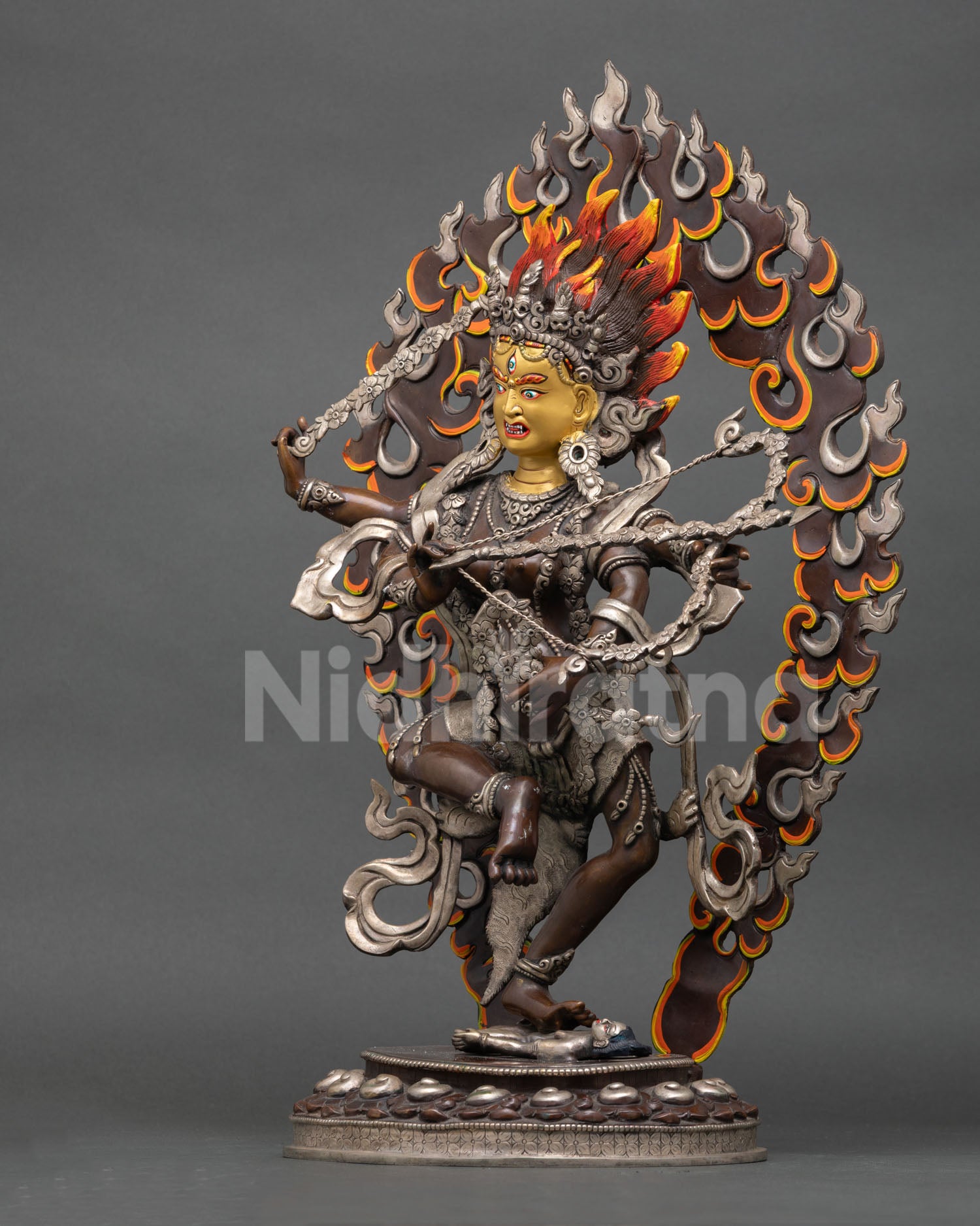 Left side view of Kurukulla statue, oxidized copper Himalayan Buddhist sculpture