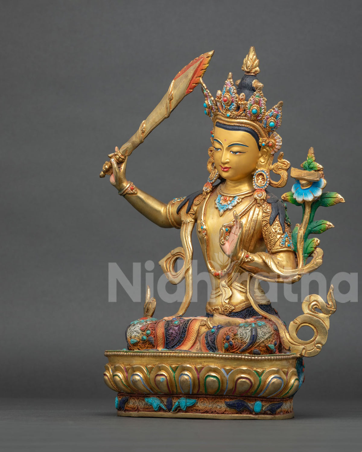 Left Side View of Manjushri Statue from Nepal with Utpala Flower and Prajnaparamita Sutra