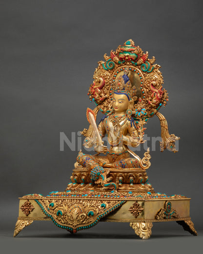 Left Side View Of Manjushri Statue With Lotus Seat And Ornate Halo Design