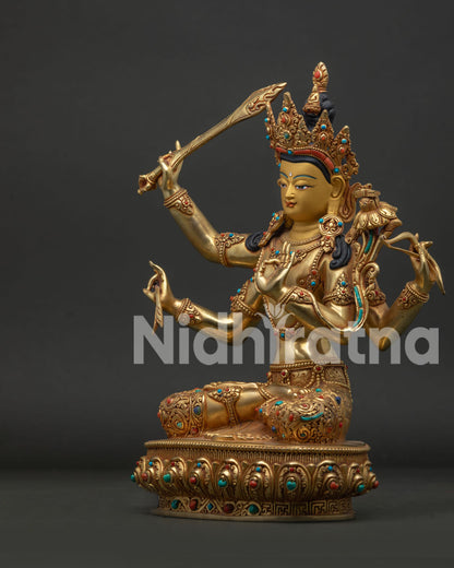 Left side view of Namasangiti Maha Manjushri Statue with sacred bow sword and sutra