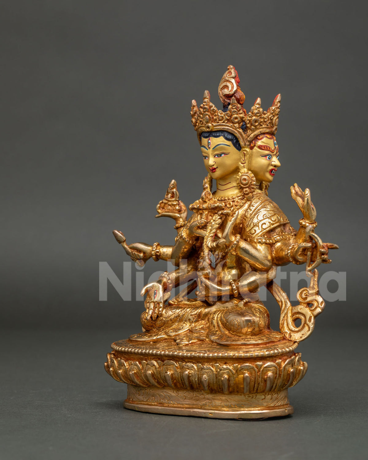 Left side view of Namgyalma Buddhist Statue with intricate carvings and ornamentation