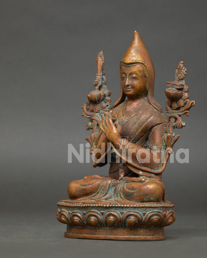 left side view of oxidized copper je tsongkhapa statue for buddhist altar