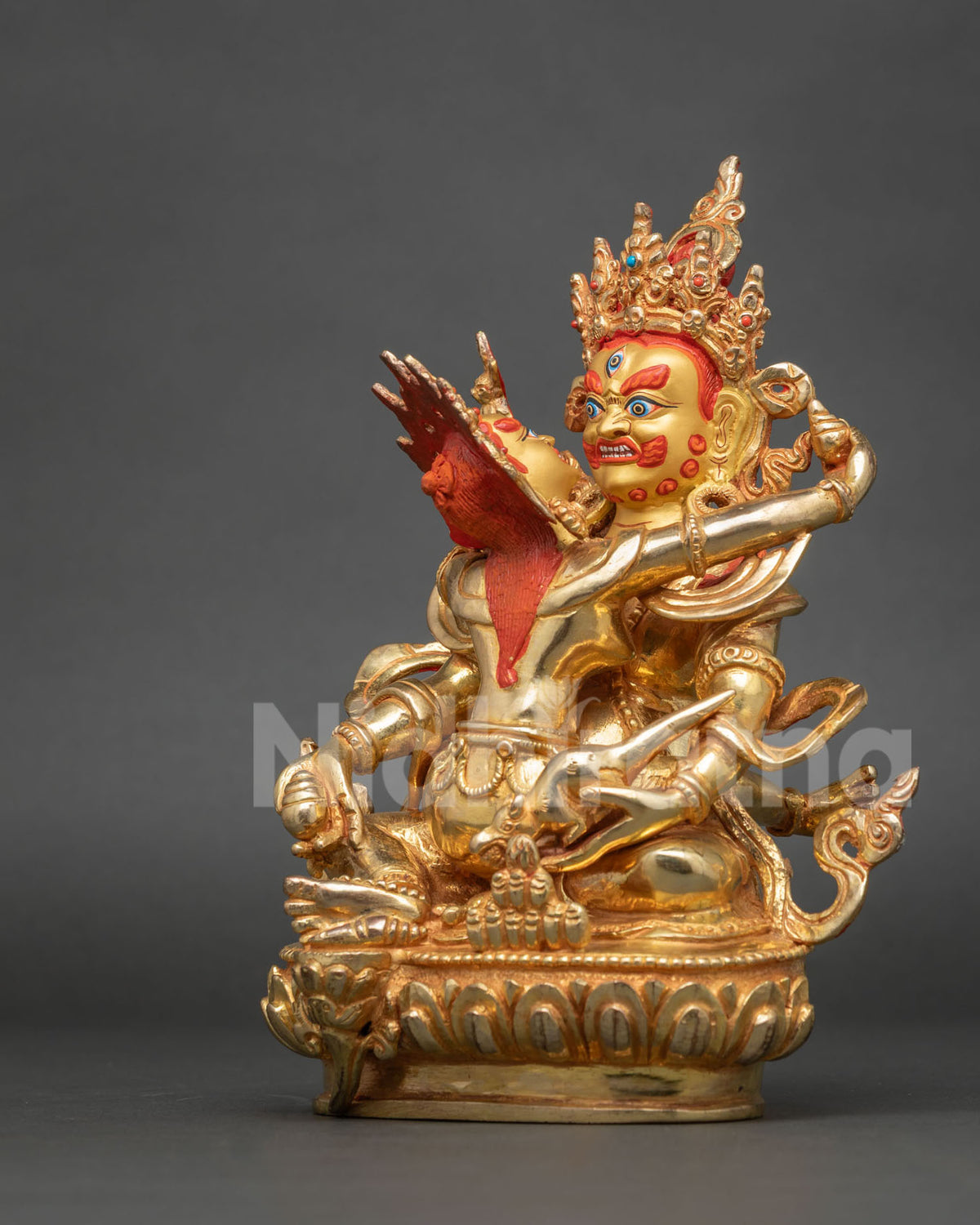 Left side view of Red Dzambhala Yab-Yum statue with 24K gold fire-gilded finish from Nepal