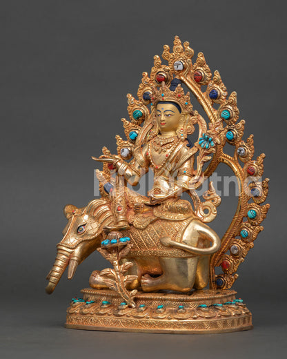 Left side view of Samantabhadra Buddha statue with fire gilded copper craftsmanship