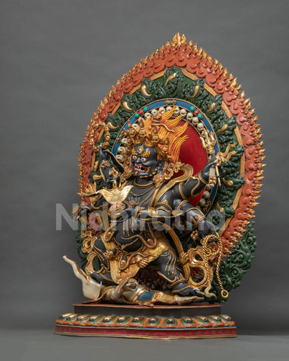 Left side view of Shadbhuja Mahakala sculpture holding Kartika knife and Kapala, Newari craftsmanship