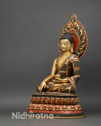left side view of shakyamuni buddha statue in gold gilded copper nepalese art