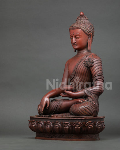Left side view of Shakyamuni Buddha statue oxidized copper finish and robe carving
