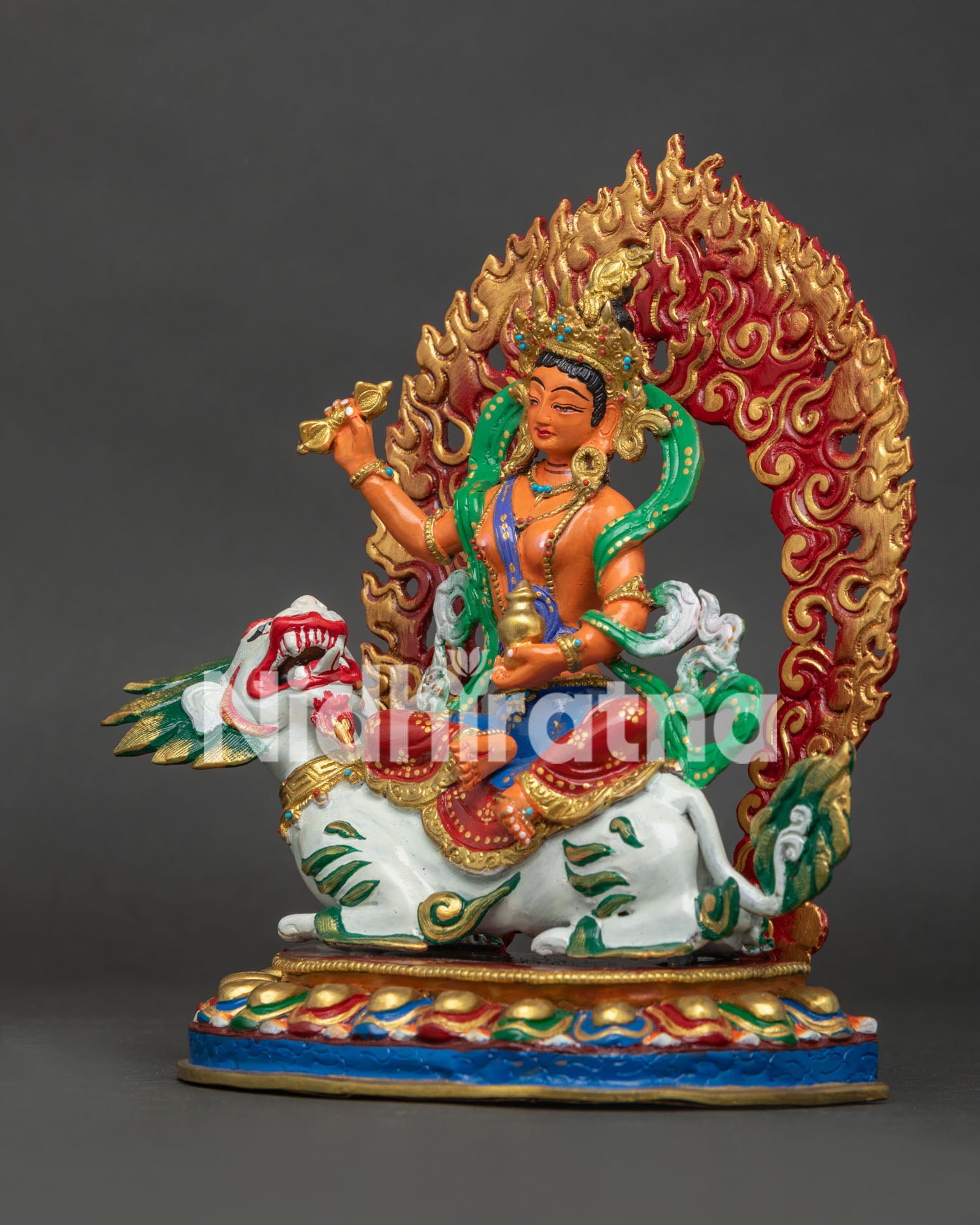 Left side view of Tashi Tsheringma statue holding the sacred nectar vase of longevity and health.
