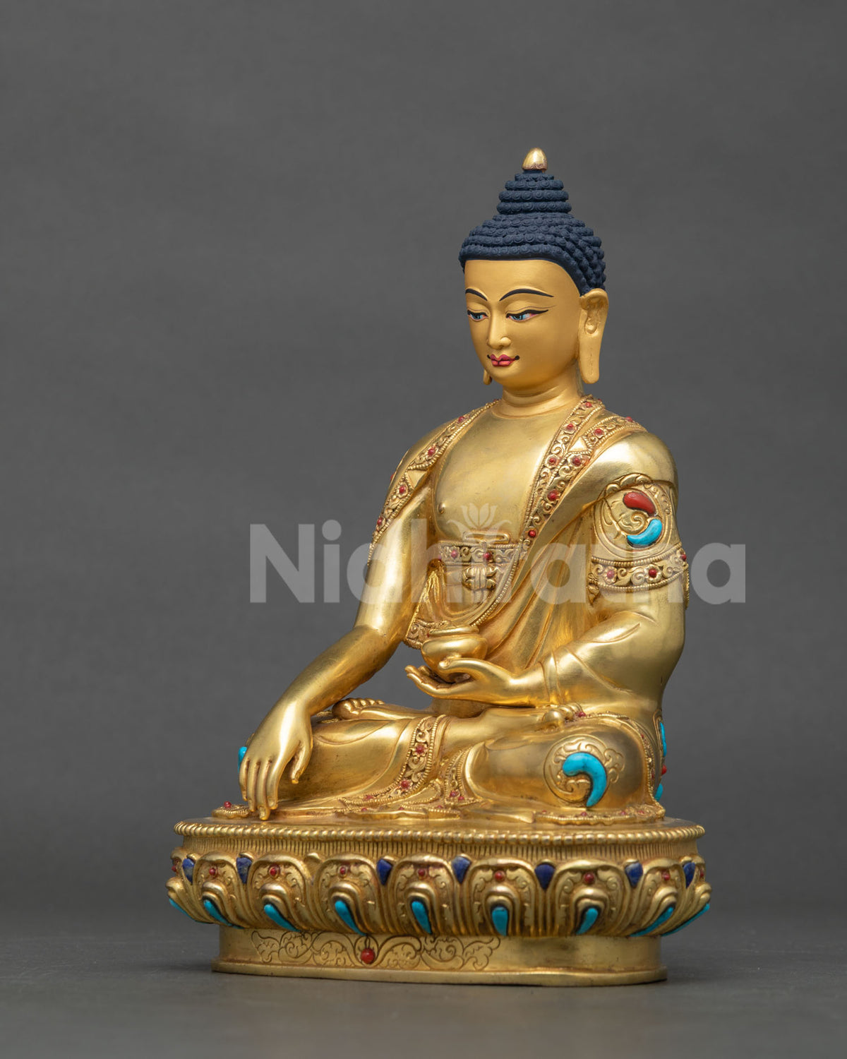 Left side view of the premium gold gilded Shakyamuni Buddha idol for home altars and mindfulness.