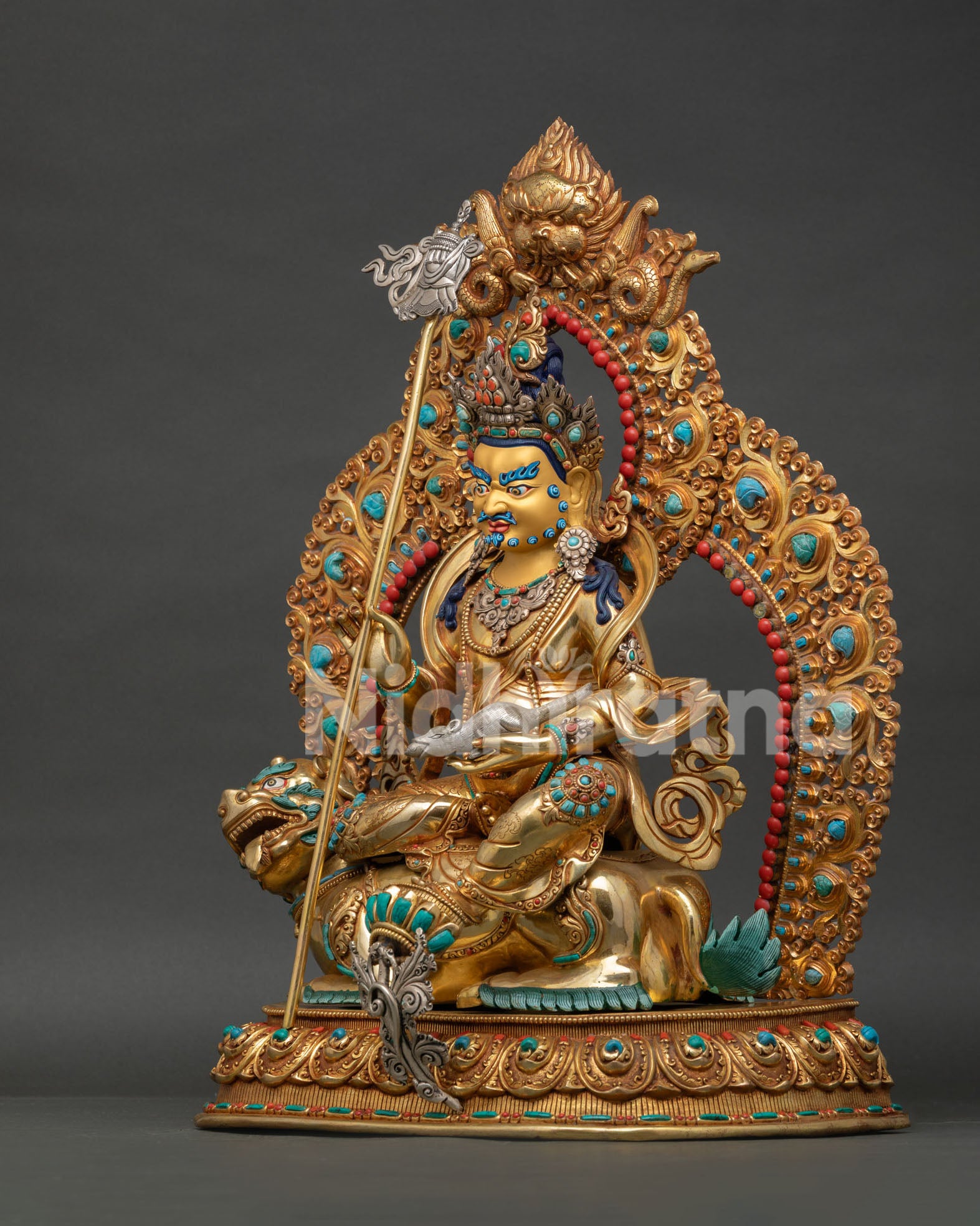 Left side view of Vaishravana Namtoshe sculpture with victory banner and mongoose