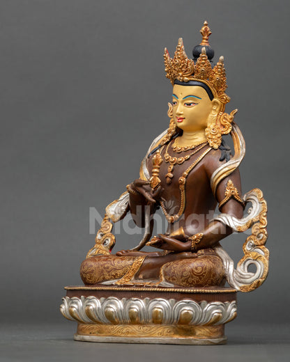left side view of vajrasattva purification deity statue in oxidized copper finish
