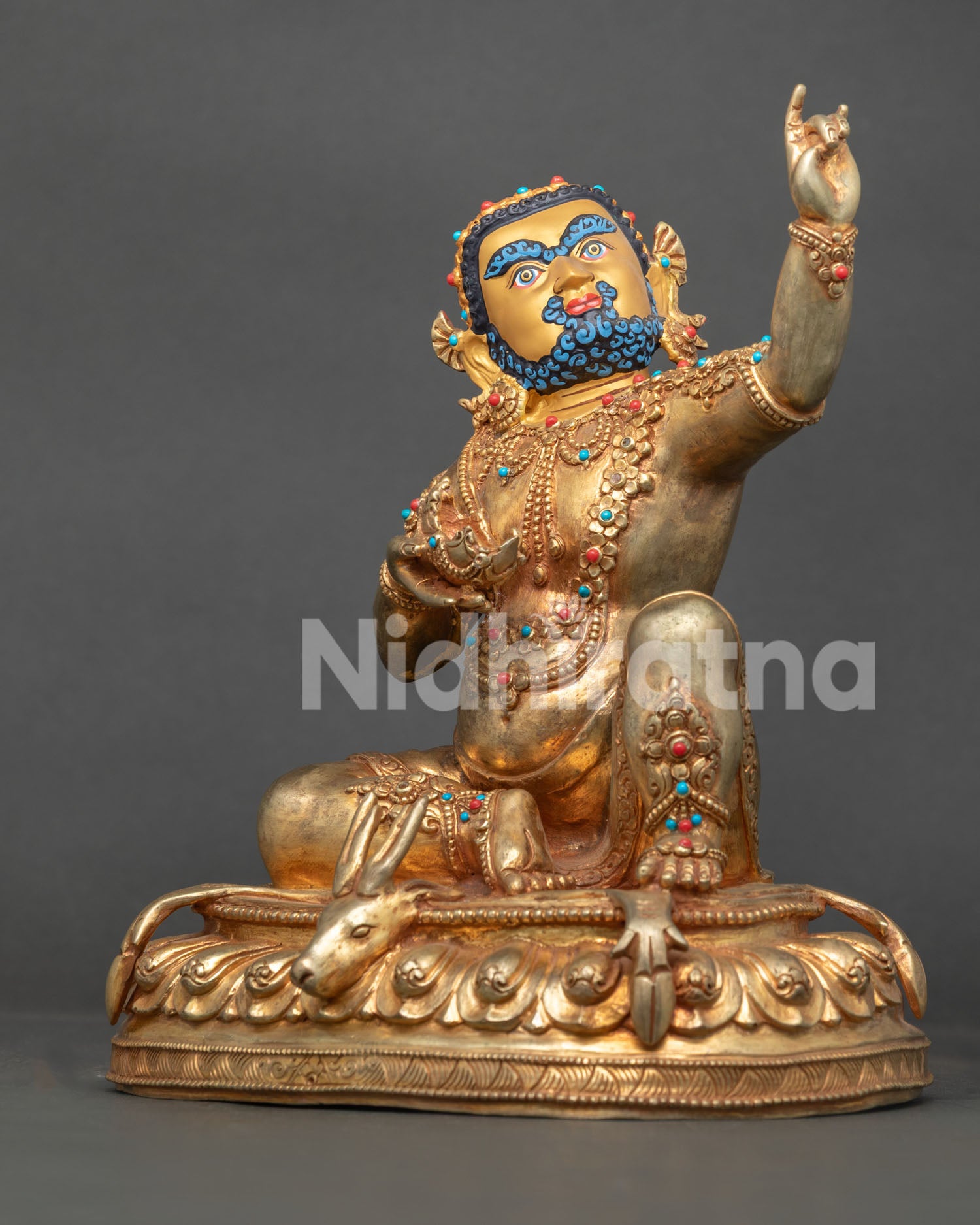 Left-side view of Virupa Statue in 24K gold-gilded copper with elaborate lotus pedestal and sacred symbols
