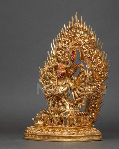 Left side view of Yamantaka with multiple heads, arms, and legs