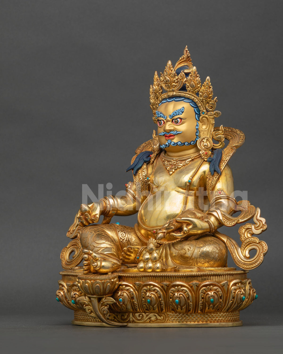Left side view of Yellow Dzambhala statue, 24K gold fire-gilded copper figurine, Nepal