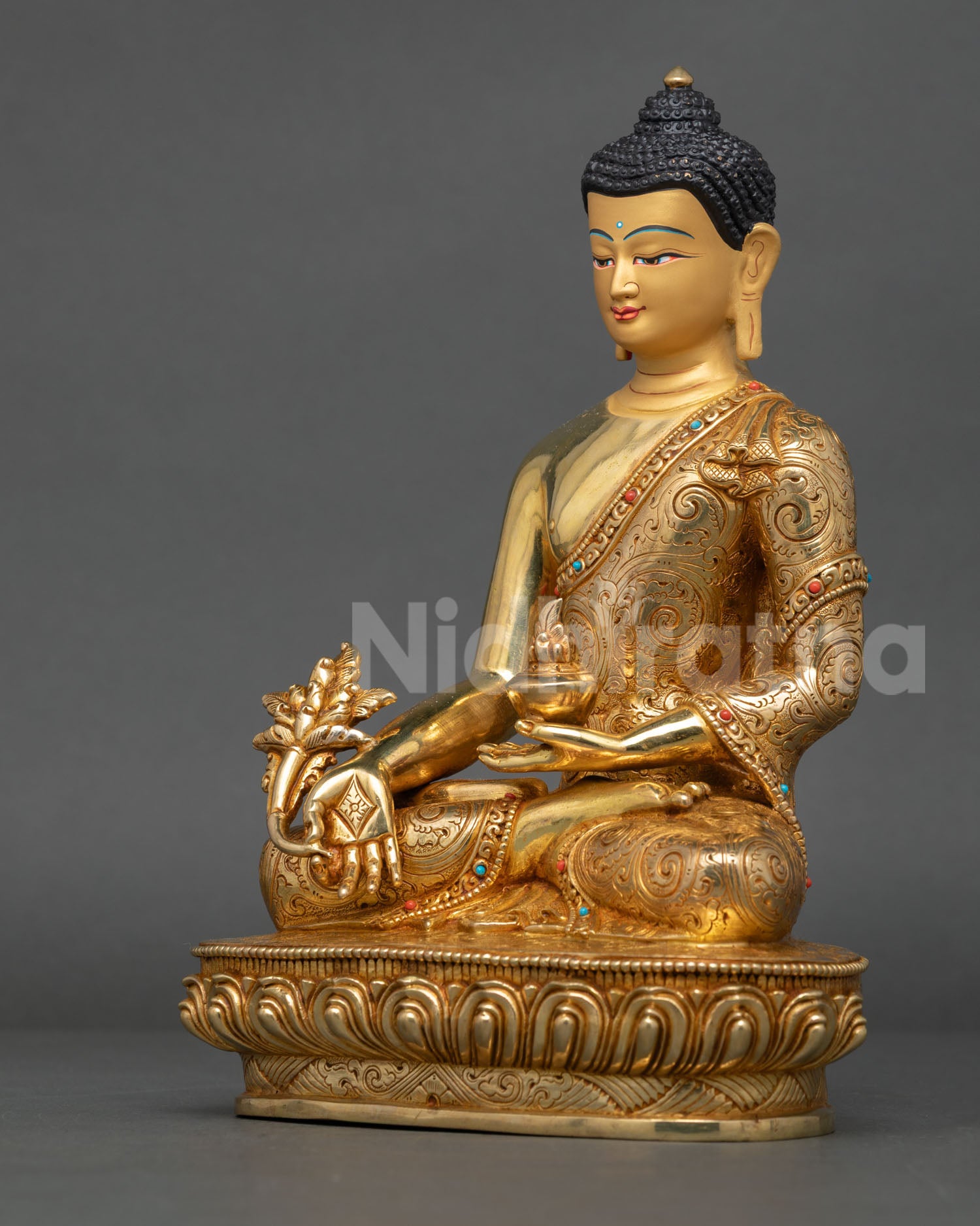 Left side view of Zen-inspired Medicine Buddha sculpture holding a traditional medicine bowl