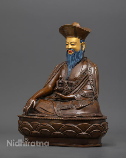 left side view of zhabdrung rinpoche statue, handcrafted copper with acrylic painted details