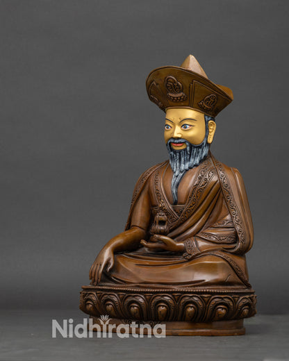Left side view of zhabdrung rinpoche statue, handcrafted nepalese copper with protective symbolism