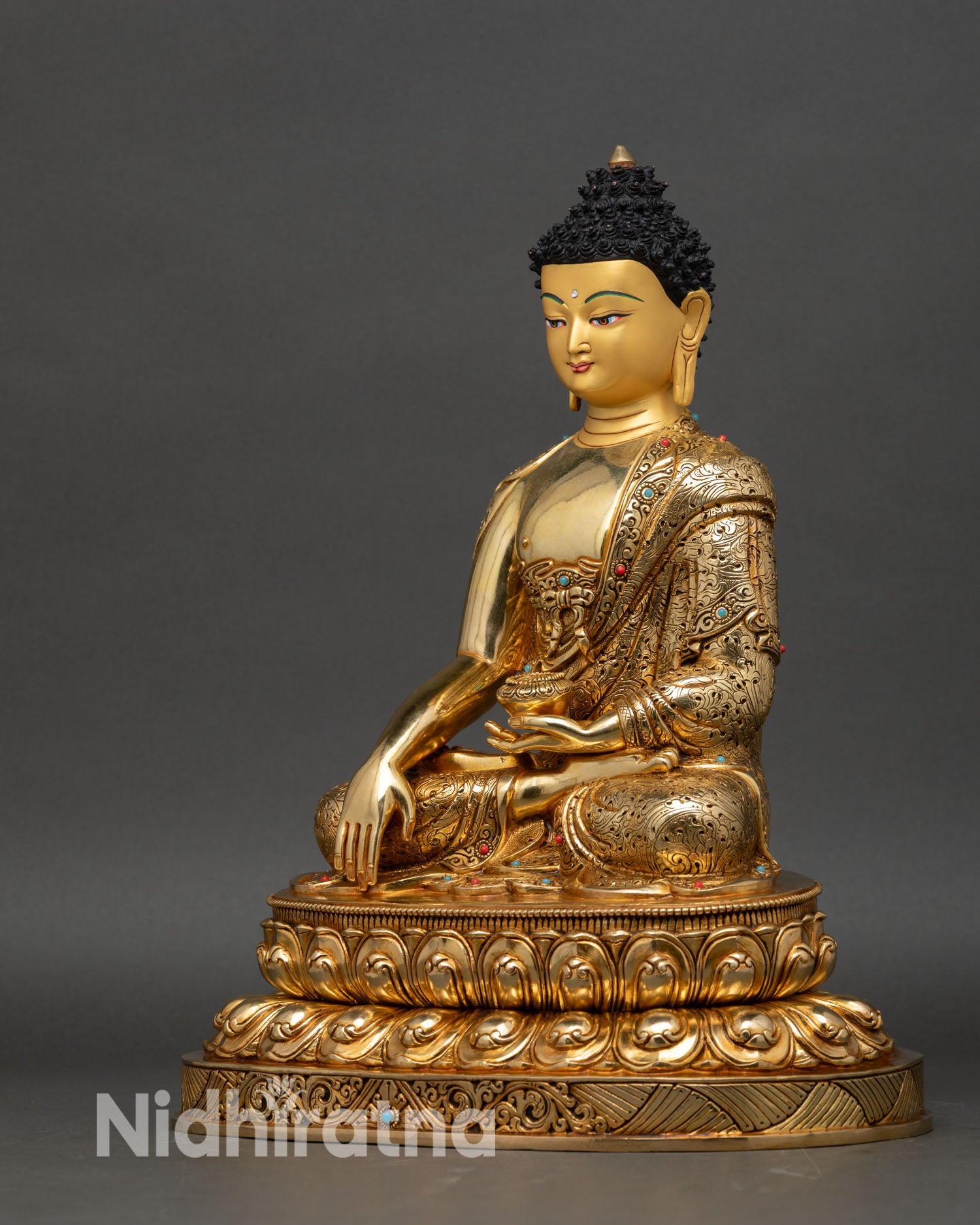 left side view shakyamuni buddha statue meditation posture alms bowl copper gold finish nepalese sacred sculpture