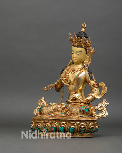Left side view of Vajrasattva statue with lotus base and stone inlays