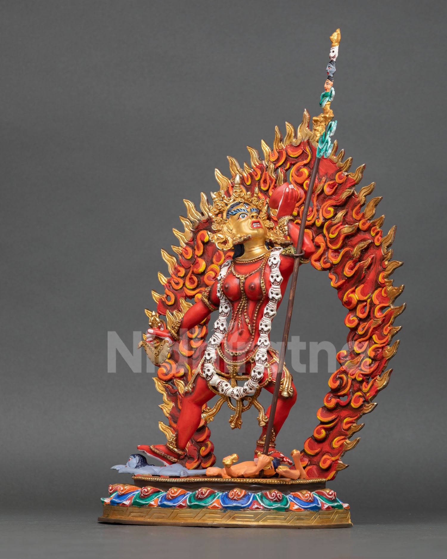 left side view Vajrayogini statue fiery hair bone ornaments Himalayan tantric art sculpture
