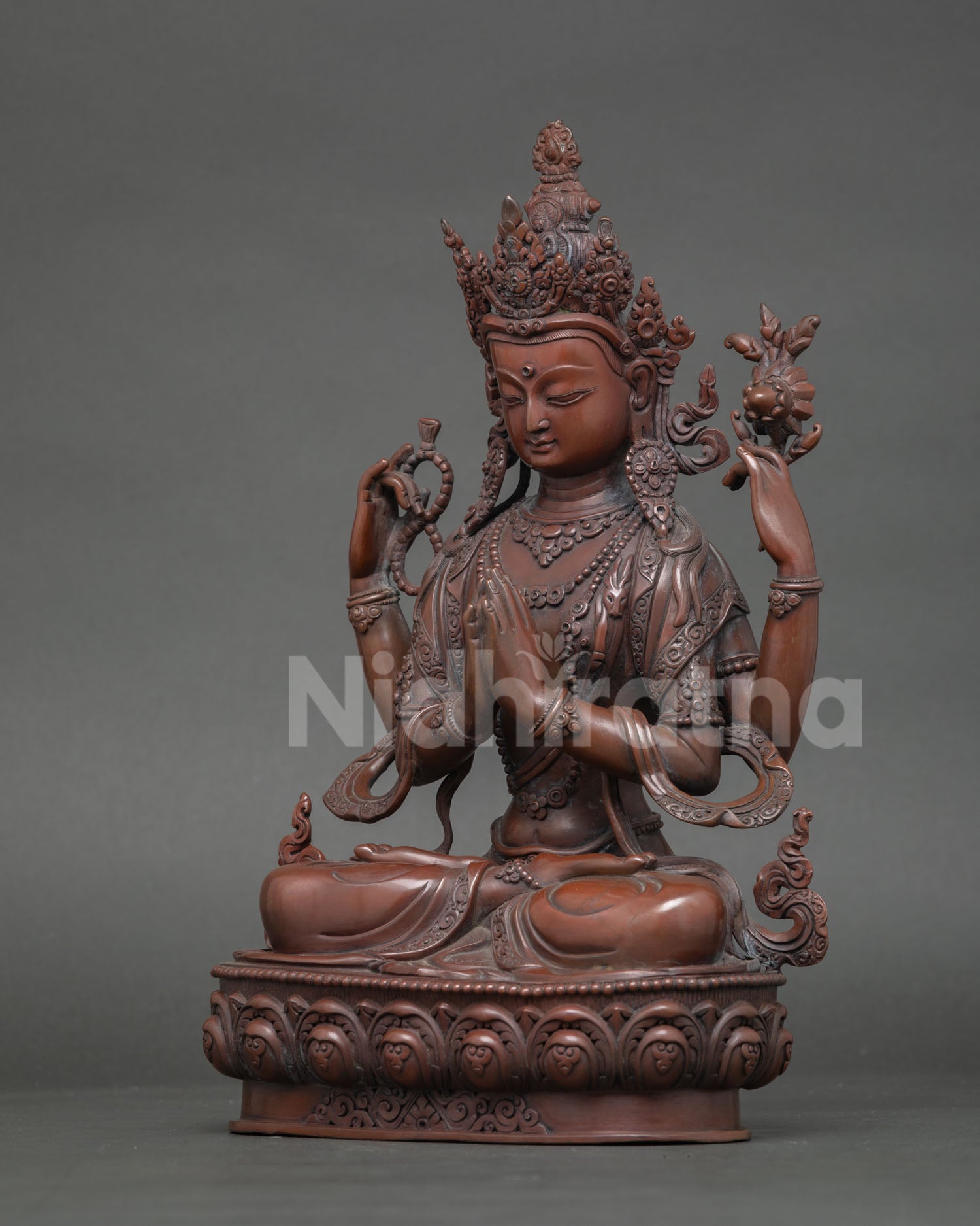 Left view of Avalokiteshvara Chenrezig statue with crown ornaments and traditional craftsmanship