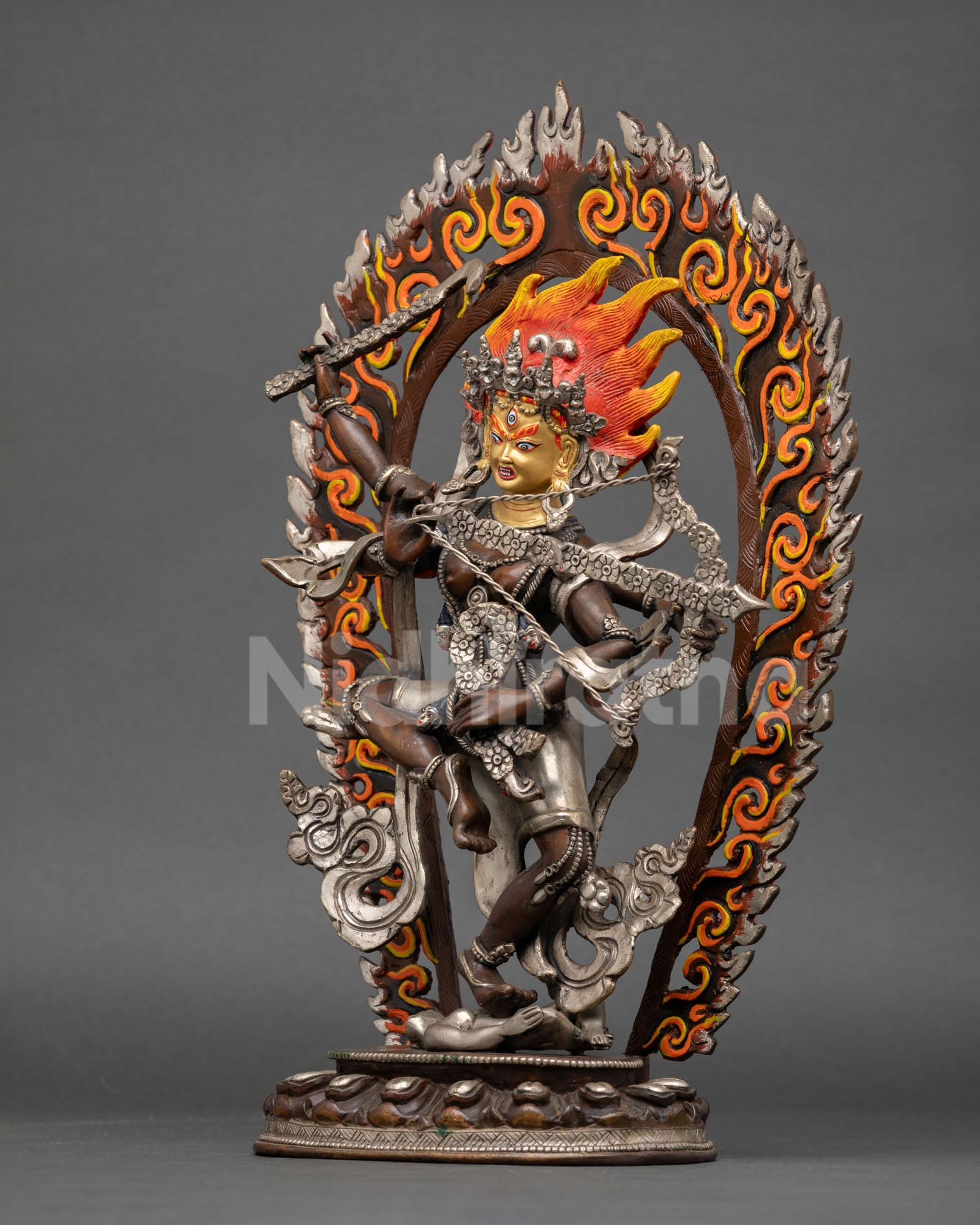 Left view Kurukulla statue, oxidized copper Buddhist goddess embodying wisdom and attraction