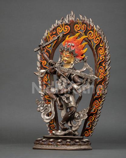 Left view Kurukulla statue, oxidized copper Buddhist goddess embodying wisdom and attraction