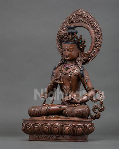 Left view of black Vajrasattva sculpture with flowing robes and halo details
