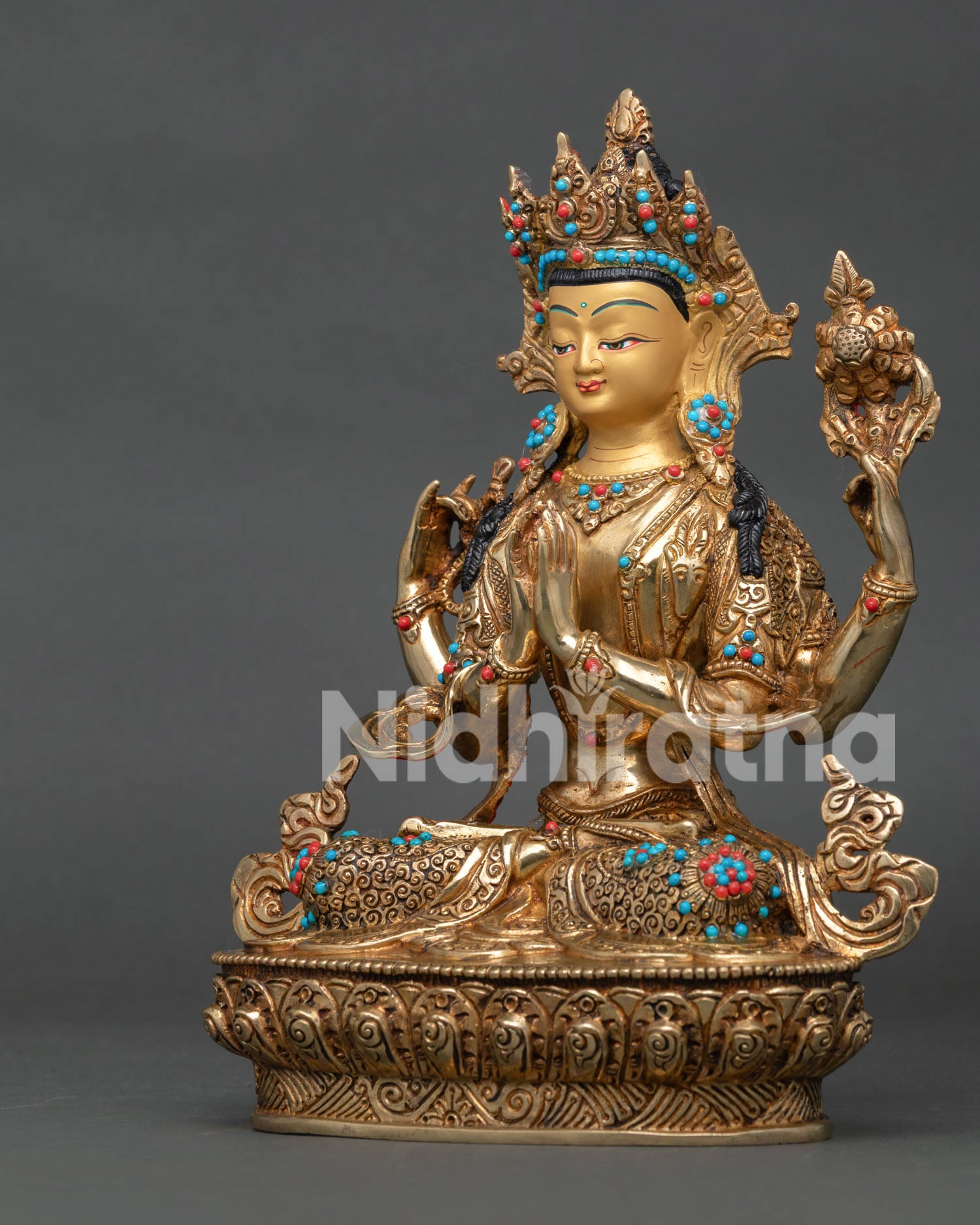 Left view of Chenrezig Bodhisattva Statue with lotus pedestal and gold gilded details