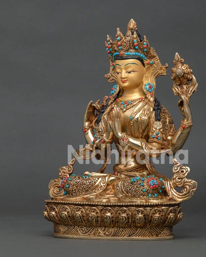 Left view of Chenrezig Bodhisattva Statue with lotus pedestal and gold gilded details