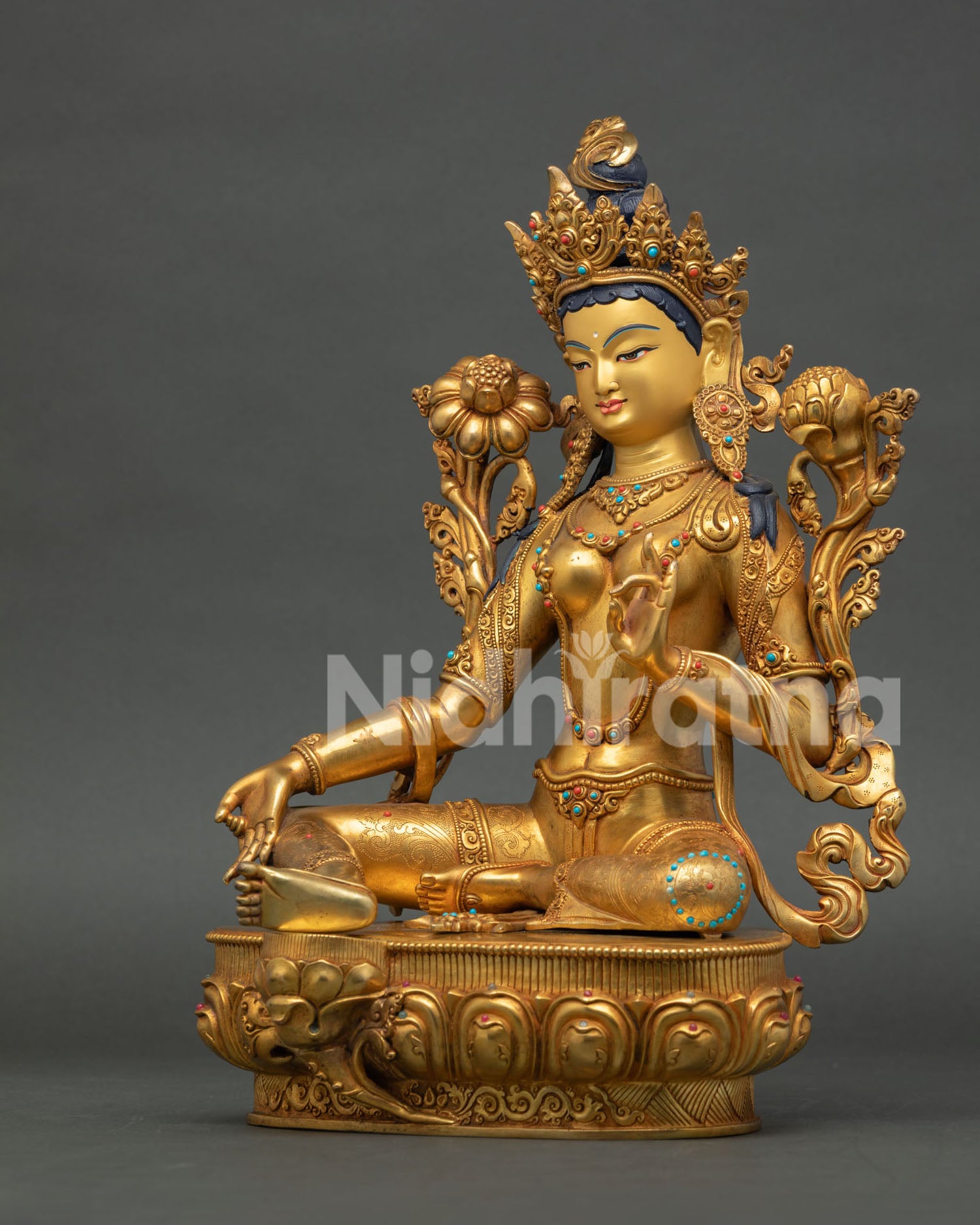 Left view of Green Tara Statue with fire-gilded copper craftsmanship