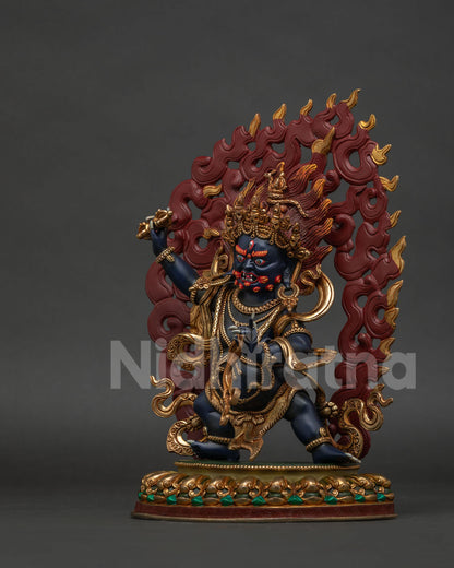 Left view of handcrafted Vajrapani protector holding a vajra and lasso on lotus pedestal.