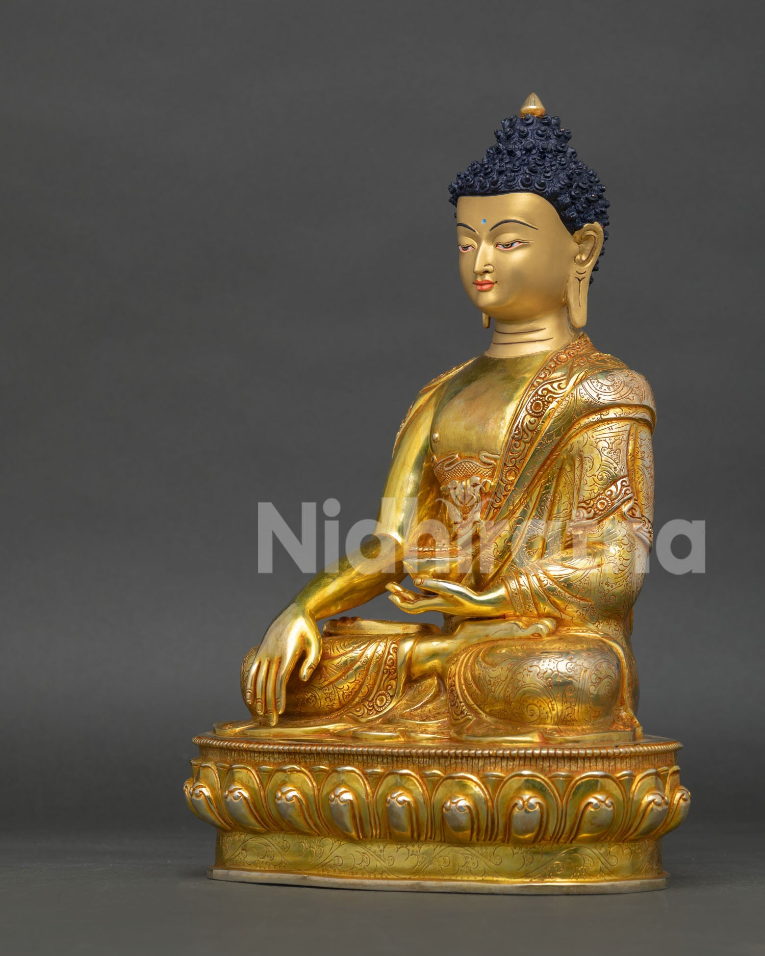 left view of shakyamuni buddha statue showcasing handmade nepalese craftsmanship