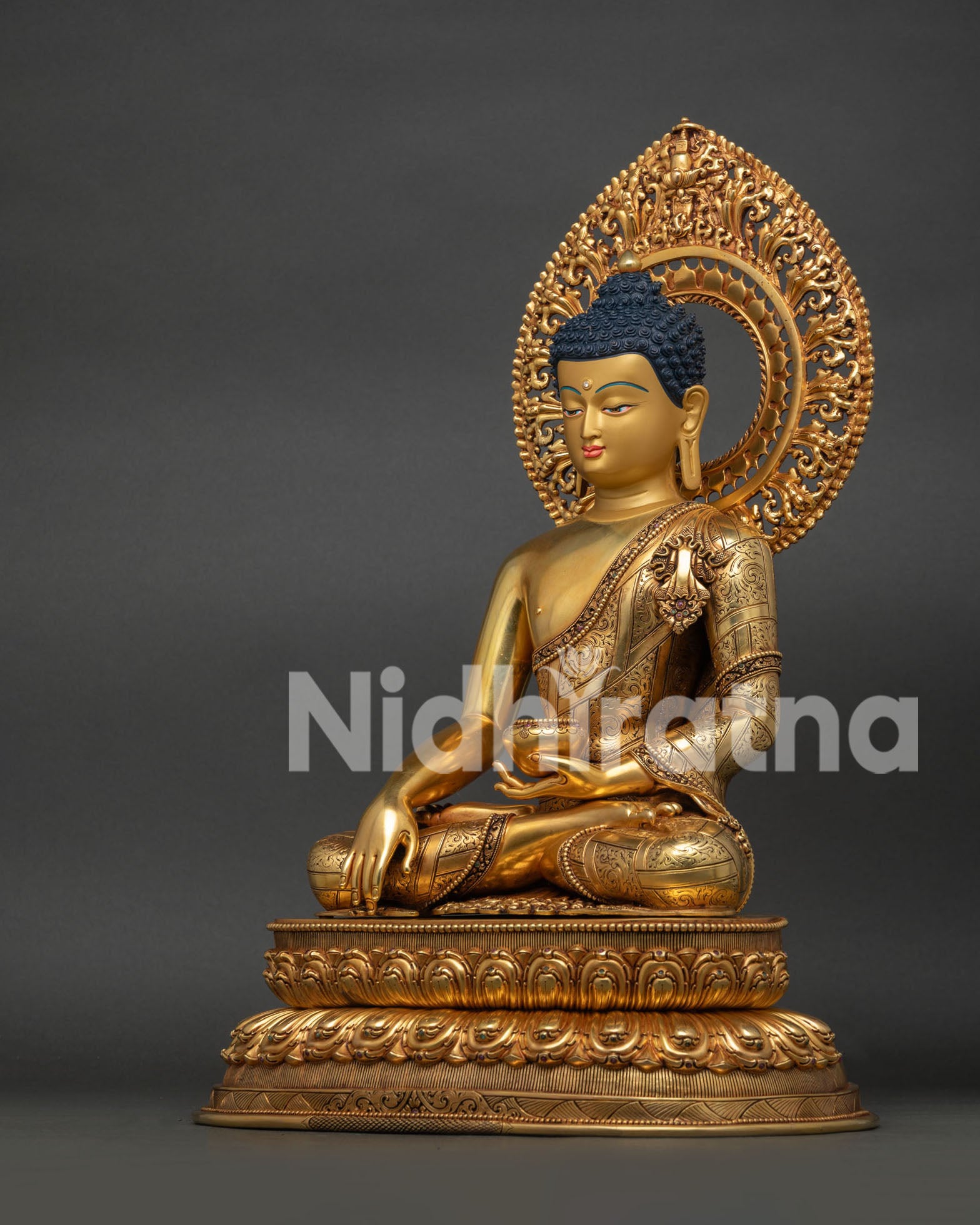 Left View of Shakyamuni Buddha Statue Showing Copper Craftsmanship and Robes