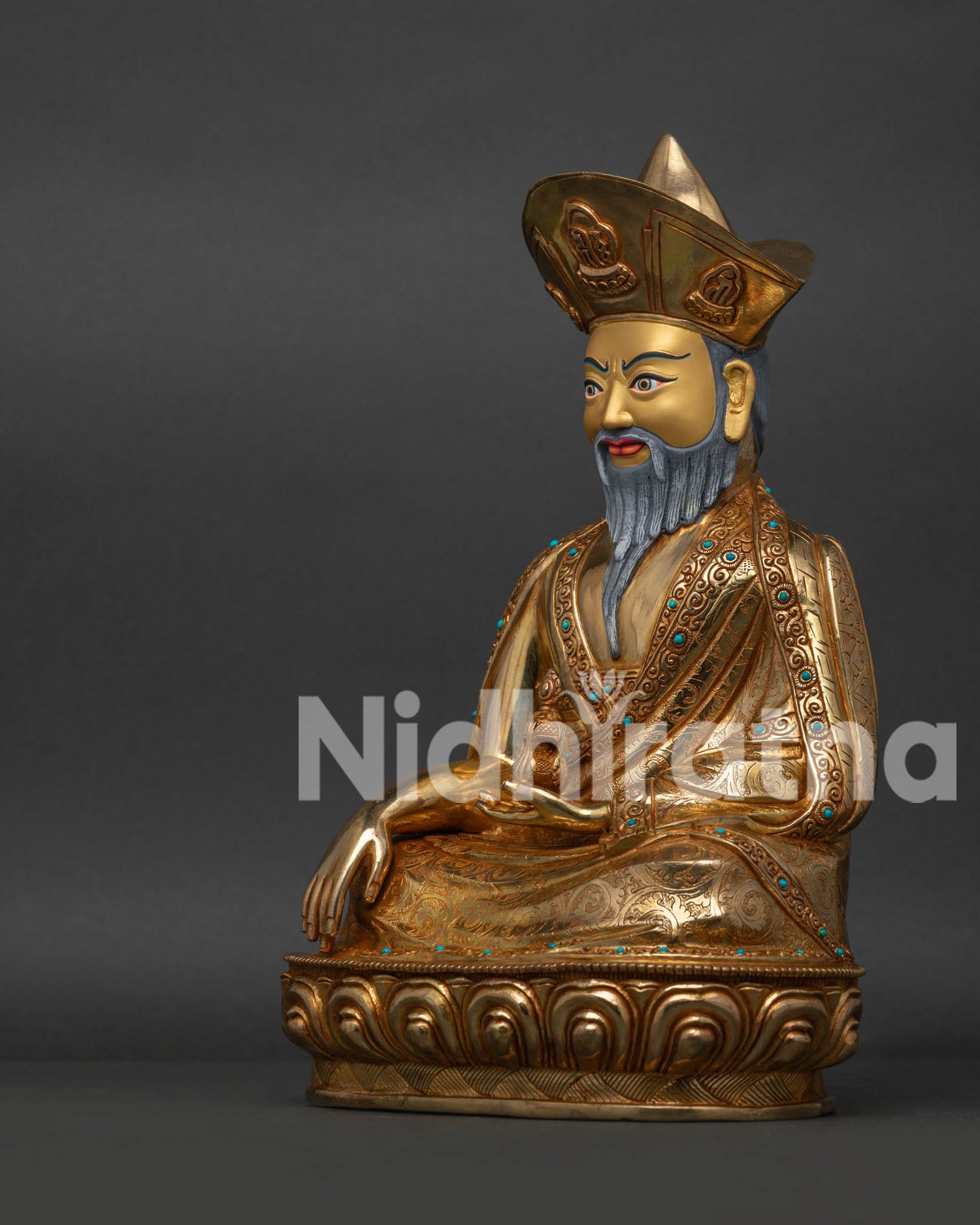 Left view of Zhabdrung Ngawang Namgyal Statue showing intricate handcrafted details