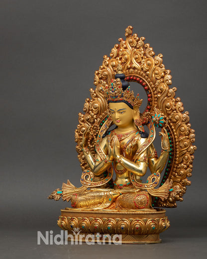 Left view side Chenrezig statue in gold and copper detailed features