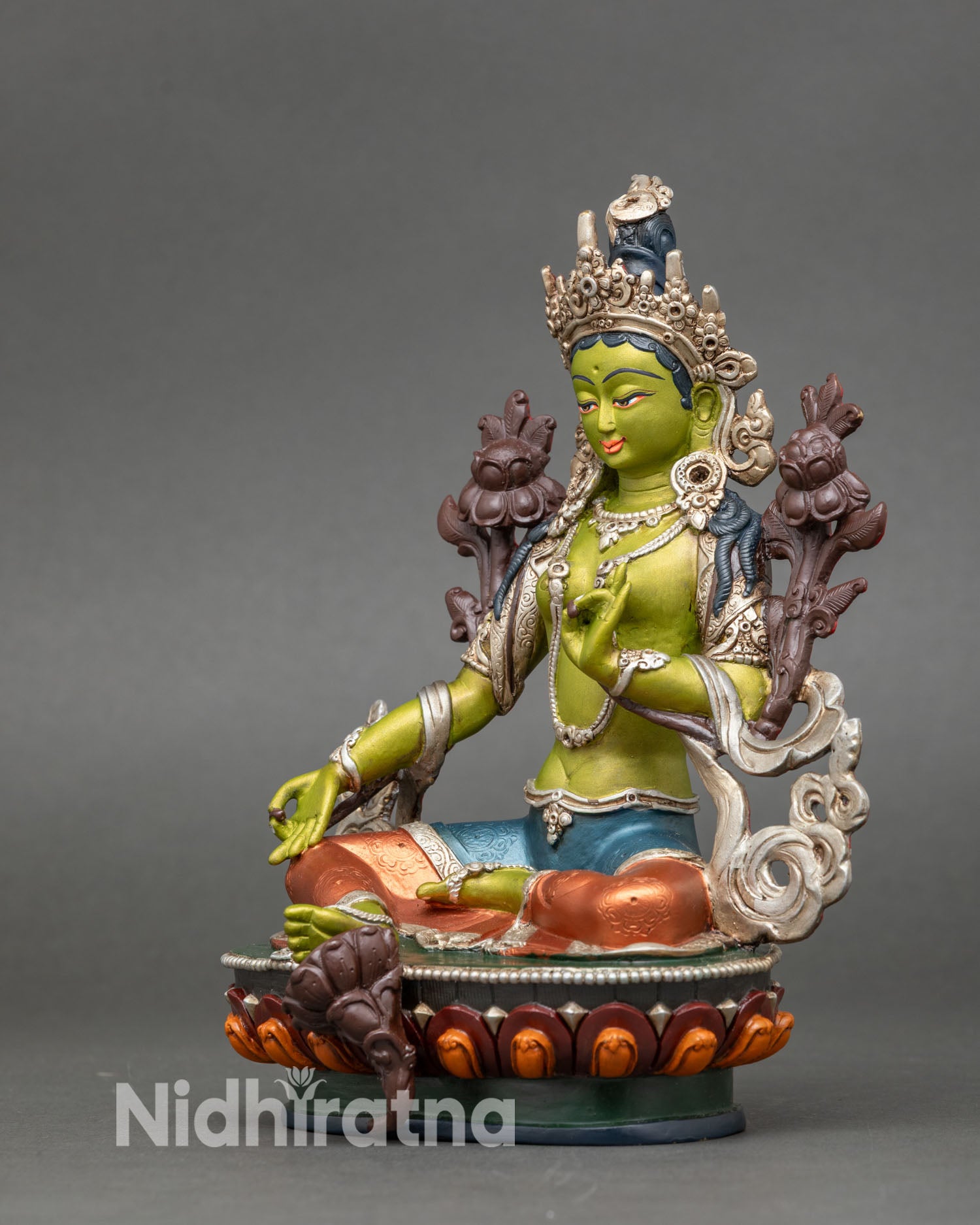 Left side view of Green Tara statue, copper and acrylic finished Buddhist artwork